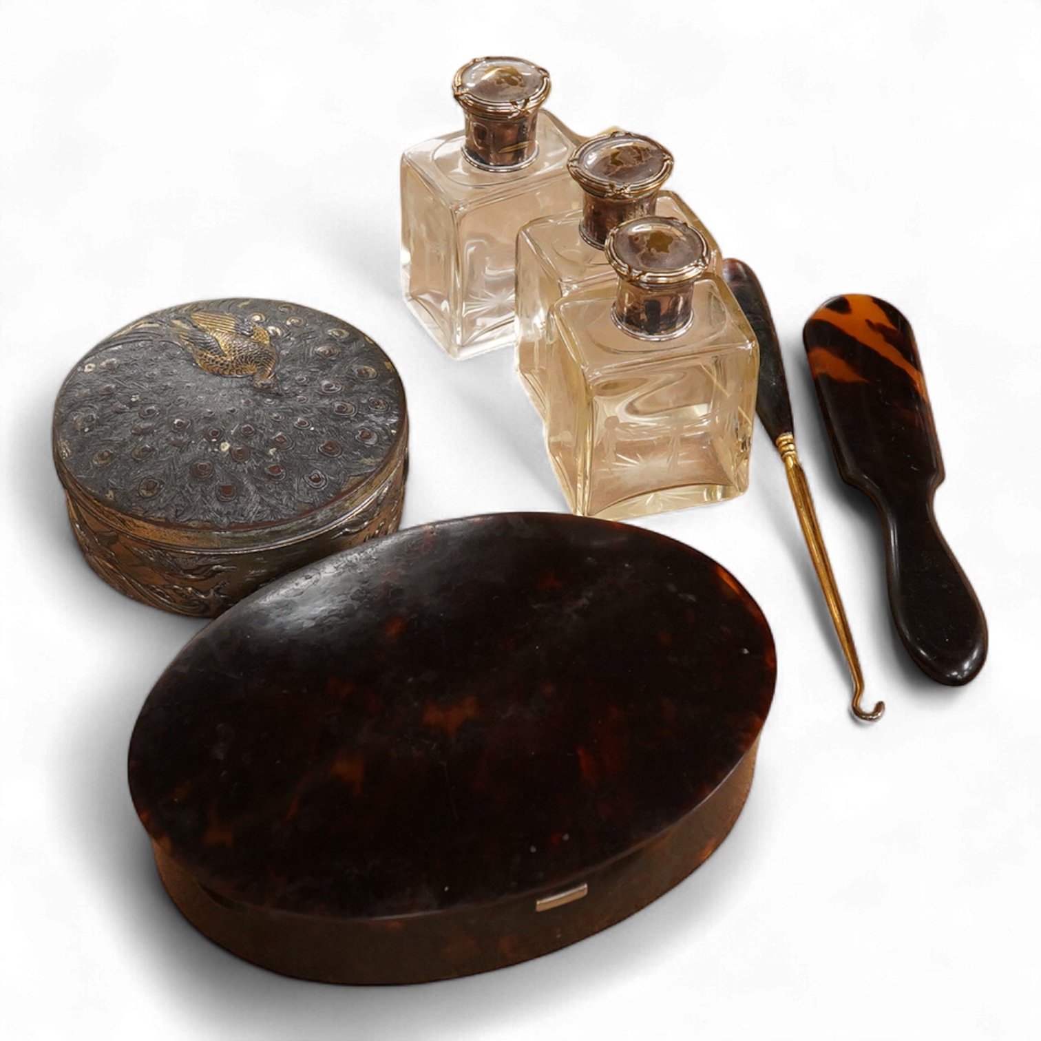 An Edwardian tortoiseshell jewellery box, a pair of gilt metal lorgnettes, a pair of half hoop gold earrings and pearl earrings, three jars etc